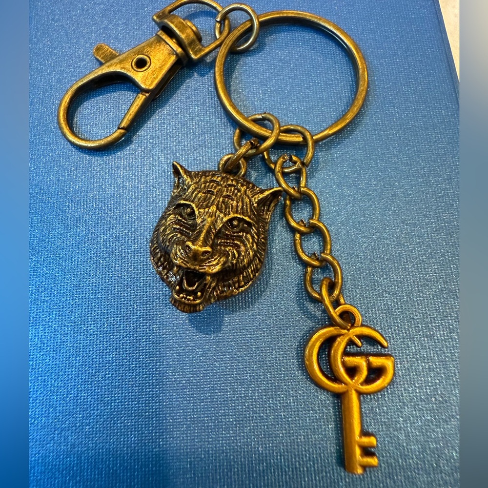 Gold Wildcat and Key Purse Charm